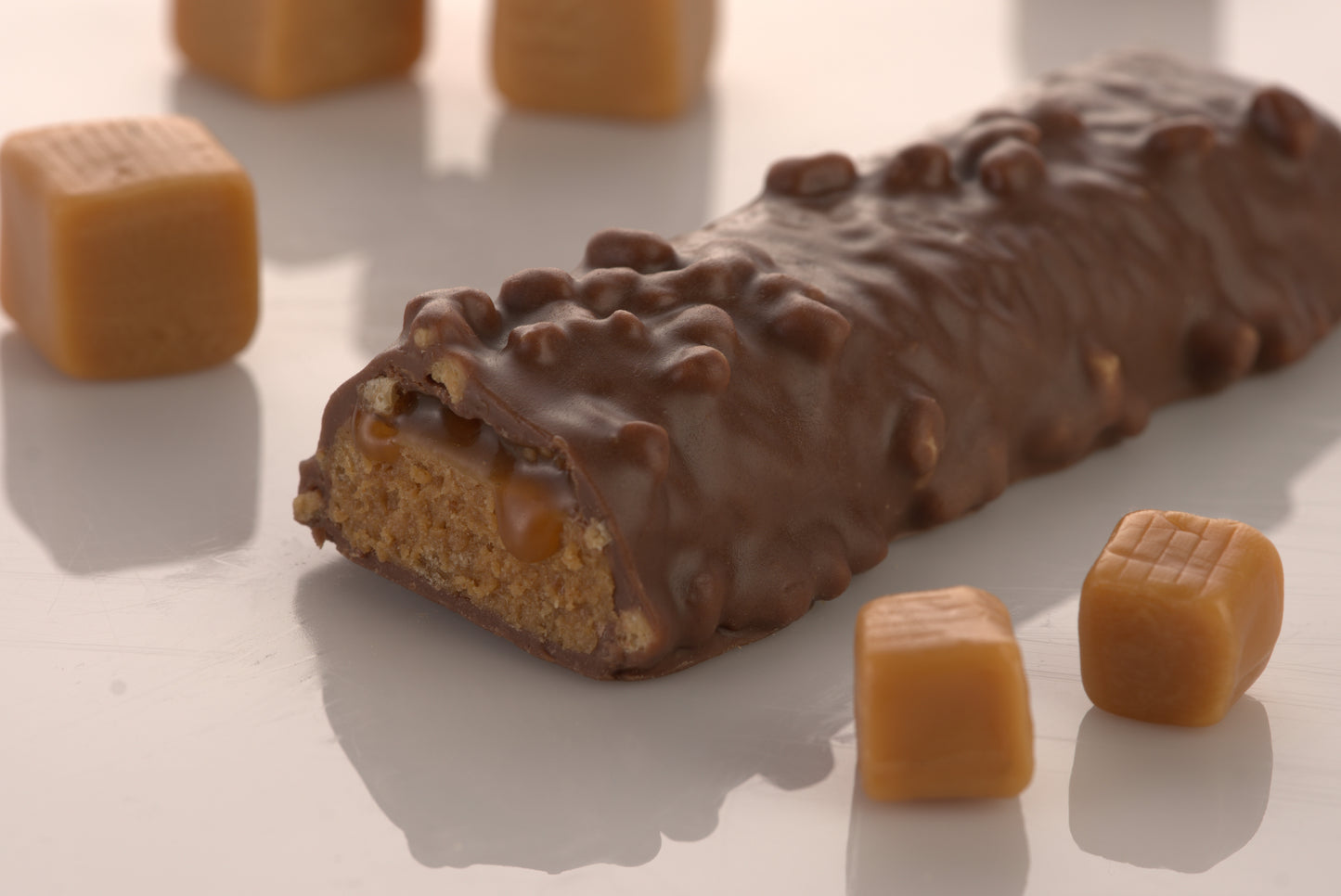 Delicious 25 grams of Protein in this Chocolate Caramel Mammoth Protein Bar. Low Sugar, Low Carb, soft inner core, big crunch!